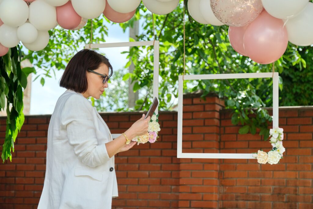 Decorating the garden with balloons for a party, ceremony