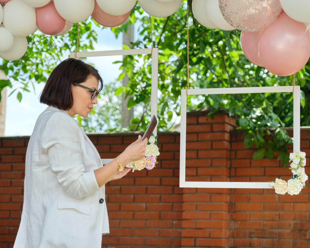 Decorating the garden with balloons for a party, ceremony